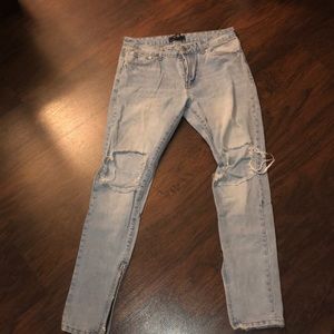 Distress light blue with zipper on the ankles